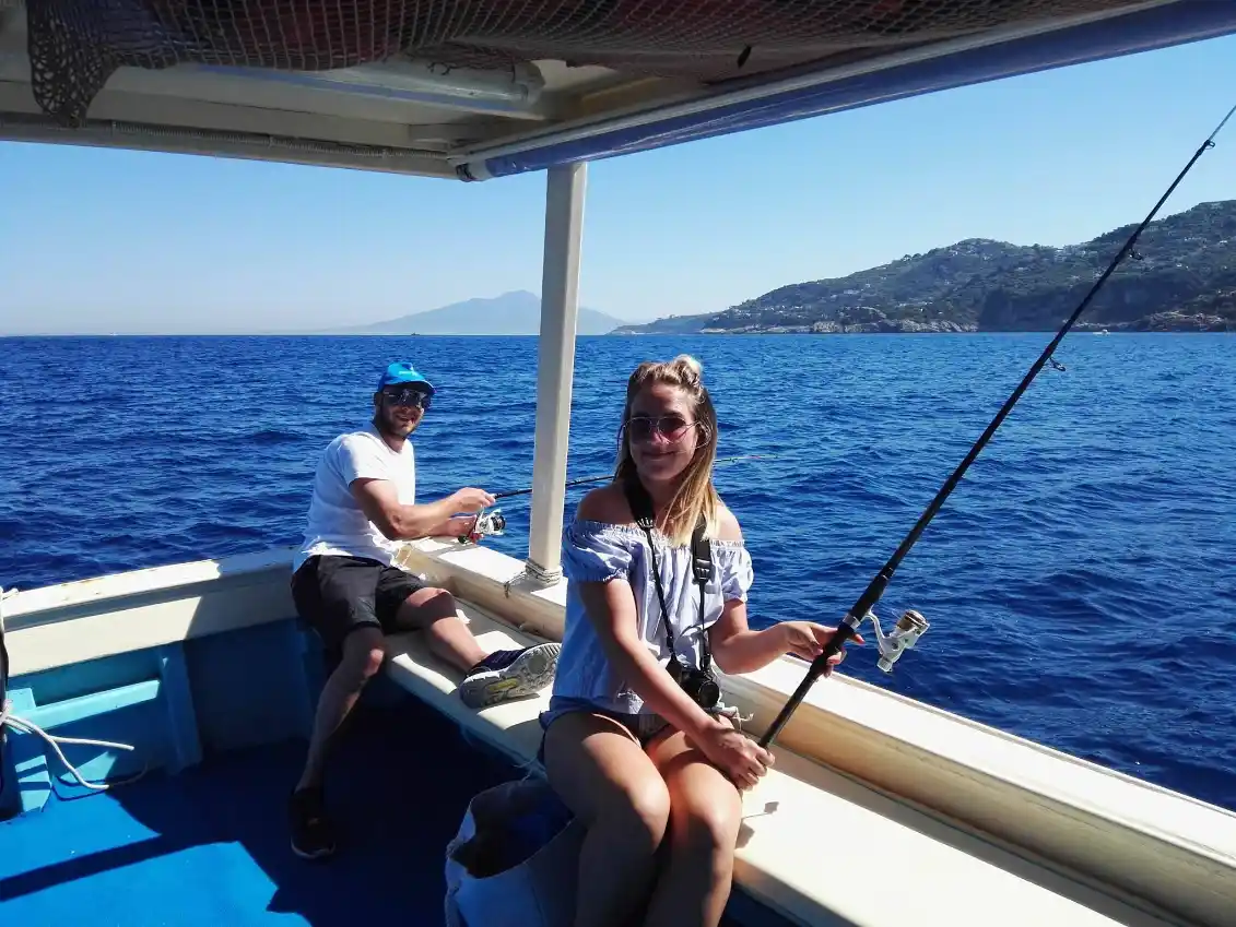 Fishing, Swimming & Relaxing On Boat With Lunch In Sorrento and Capri Coasts Italy