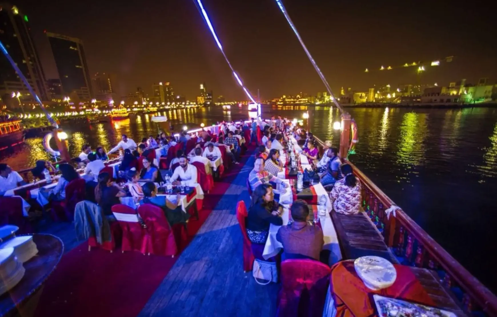 Dinner-on-Traditional-Wooden-Boat-Cruise-in-Dubai-Creek Dinner-on-Traditional-Wooden-Boat-Cruise-in-Dubai-Creek