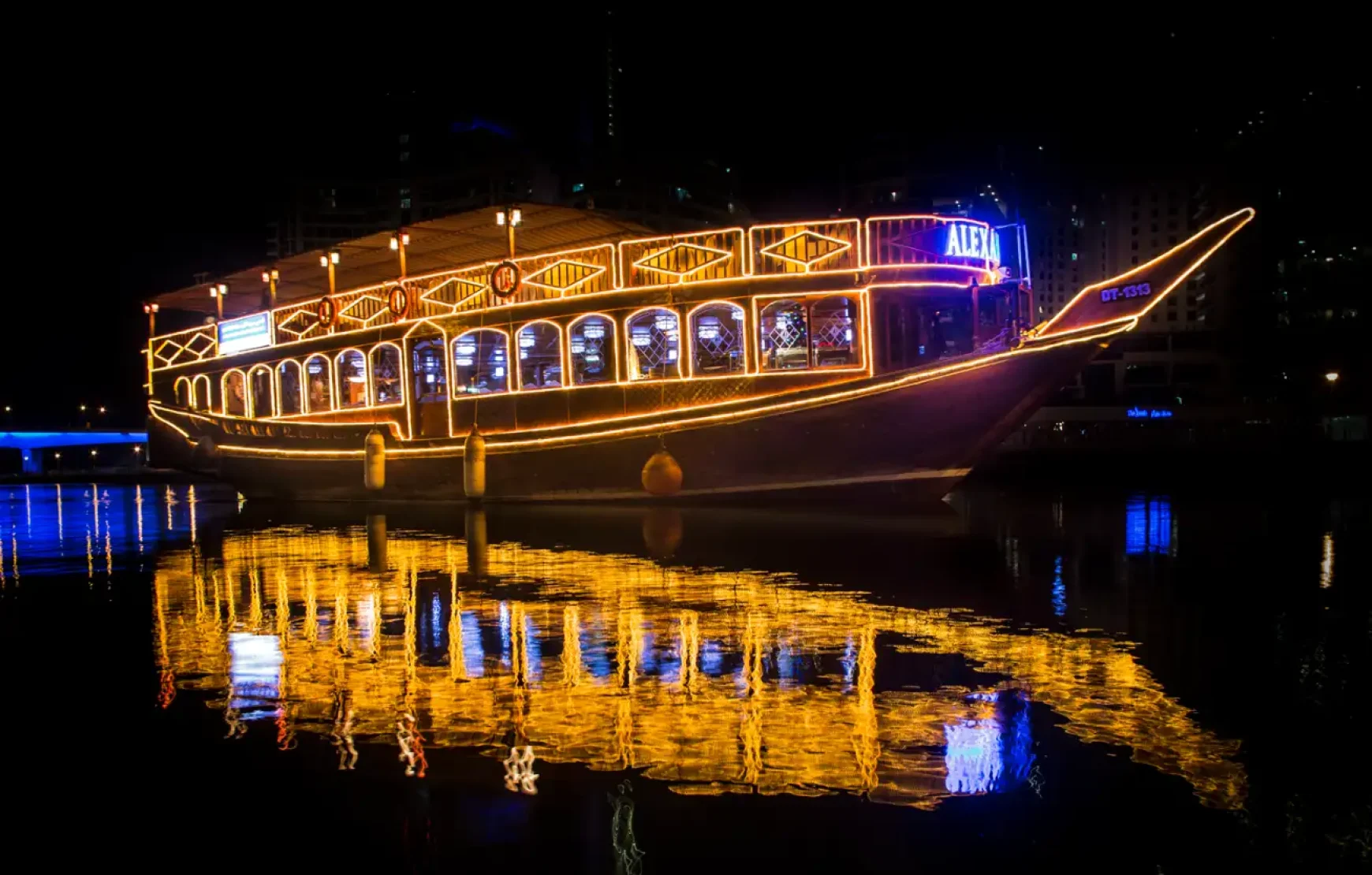 Dinner-on-Traditional-Wooden-Boat-Cruise-in-Dubai-Creek Dinner-on-Traditional-Wooden-Boat-Cruise-in-Dubai-Creek
